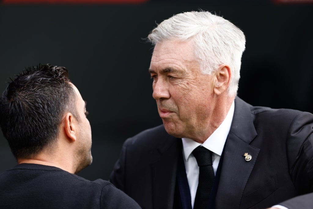 Xavi y Ancelotti, durante el clásico de Liga de la primera vuelta | Europa Press